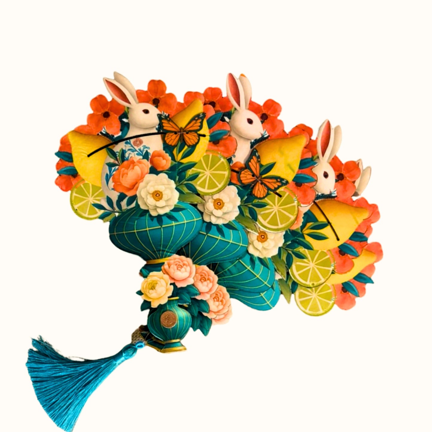 Bunny Blossom Fan, a colorful sculptural folding fan with rabbits, flowers, lemons, and a blue tassel.